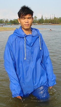 long cagoule wading into the lake